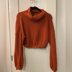 Rusty orange cropped turtleneck sweater